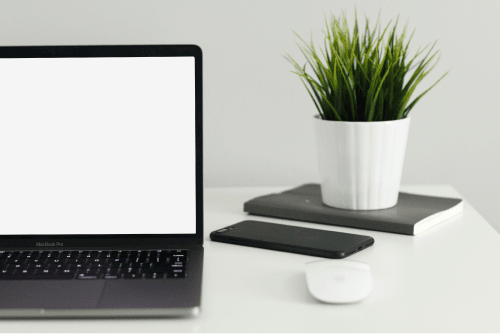 Macbook Mockup Front View On A Table