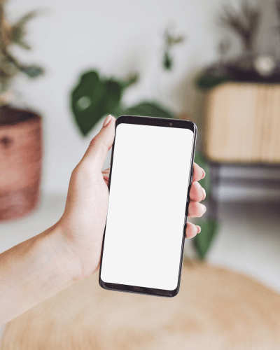 Iphone In Hand Mockup By Woman