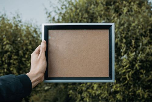Hand Holding Square Frame Mockup