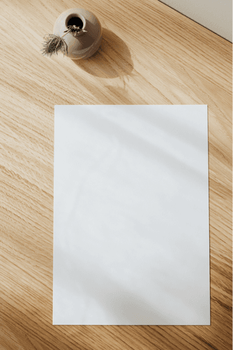 Paper Mockup On Wooden Table