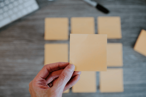 Holding Sticky Note Mockup