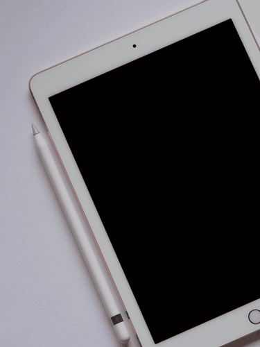 White Ipad Mockup With Pen Top View 