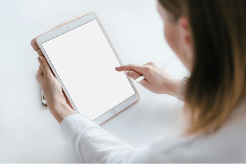 Woman Working On An Ipad Mockup