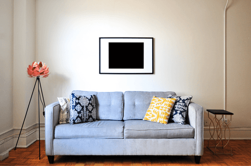Landscape Frame Mockup In Living Room Wall