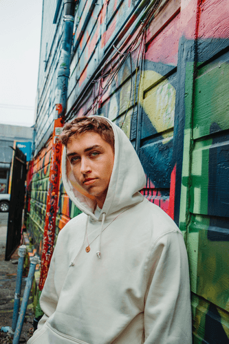 Boy In White Relaxed Hoodie Mockup